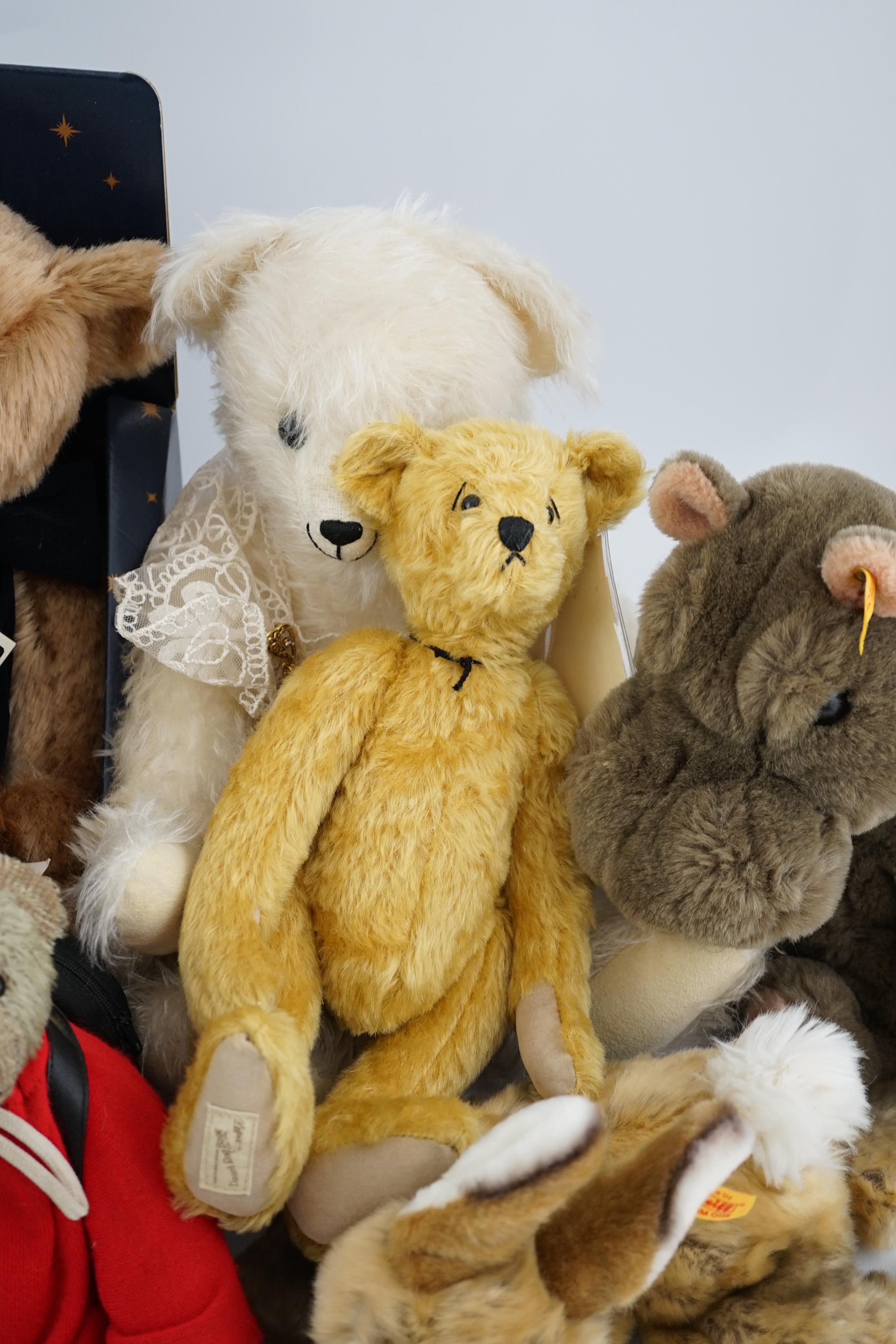 Two Merrythought John Lewis bears, a Harrodd 2000 bear, a Steiff yellow tag rabbit, two Deans bears, a Steiff Cosy Hippo and a white artist bear (8)